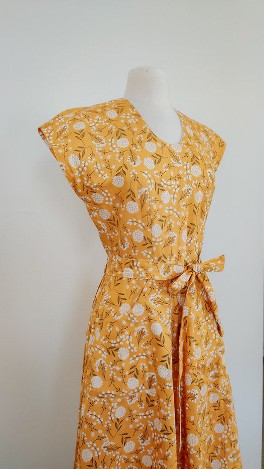 Marigold floral Swirl style wrap dress 1950s cotton day dress